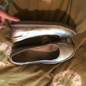 Gently used metallic silver Dr. Martens flats